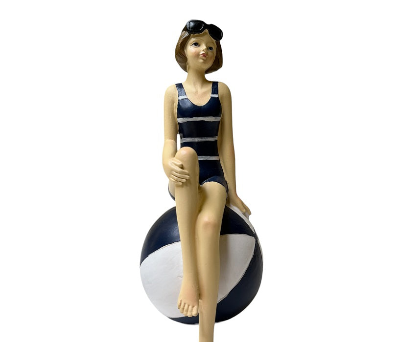 BATHERS AT THE BEACH WITH BALLOON