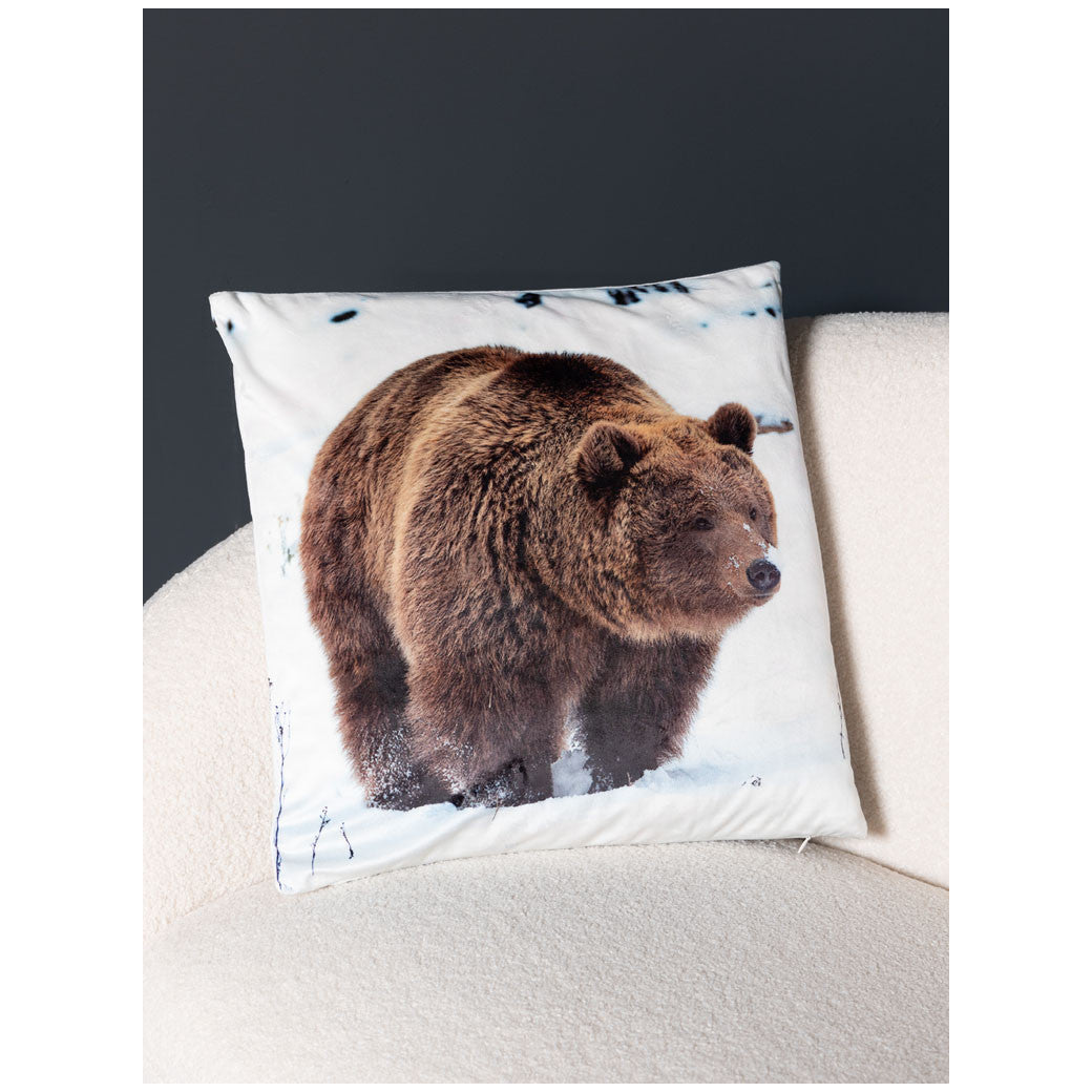 CUSHION BEAR IN SNOWY LANDSCAPE